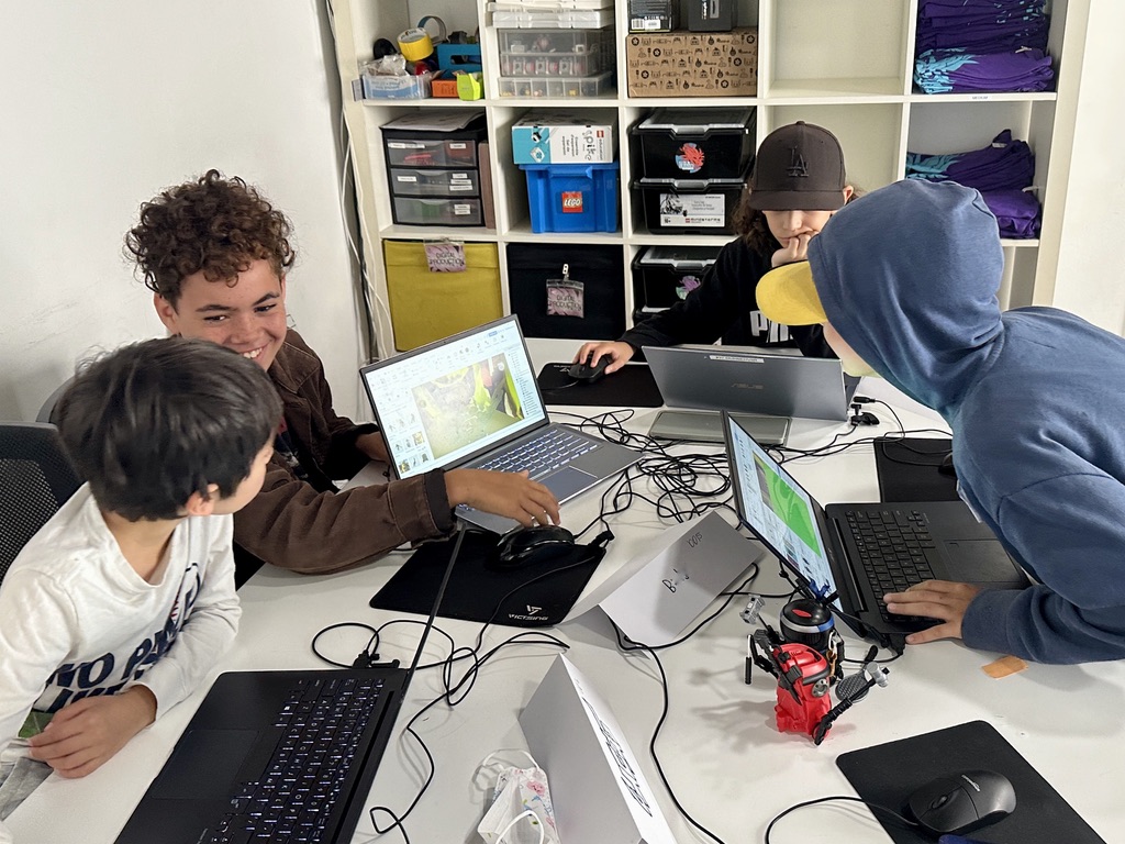 Game Design students learning how to make a Roblox Game.